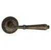 Дверная ручка на круглом основании Venezia \"CLASSIC\" D4 античная бронза