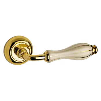 Дверная ручка на круглом основании Fimet Lady 148/231 F01 латунь