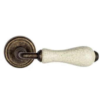 Дверная ручка на круглом основании Venezia \"COLOSSEO\" белая керамика паутинка D1 античная бронза